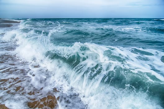 seascape with waves and sand beach scenery