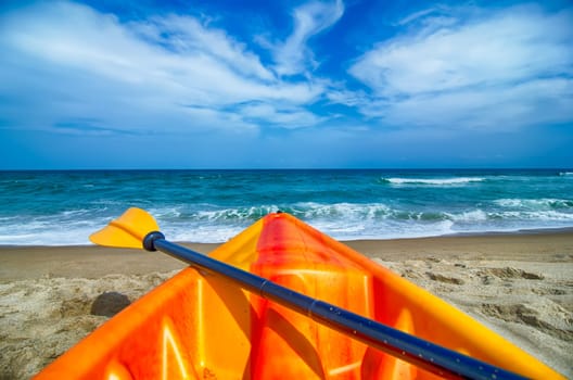 kayak looking at the beach and ocean waves