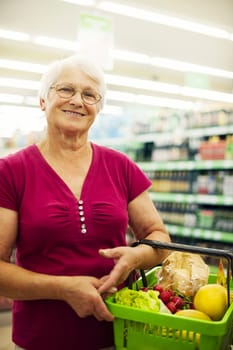 Portrait of senior woman at supermarket