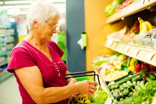 Senior woman at supermarket
