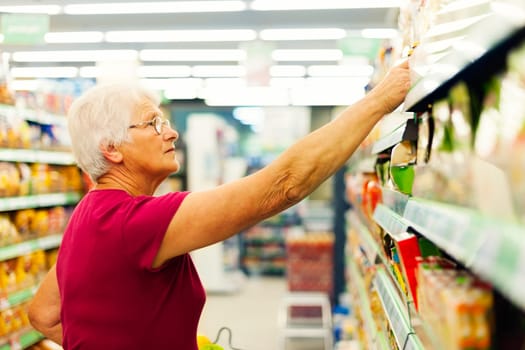Senior woman at supermarket