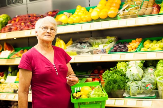 Portrait of senior woman at supermarket