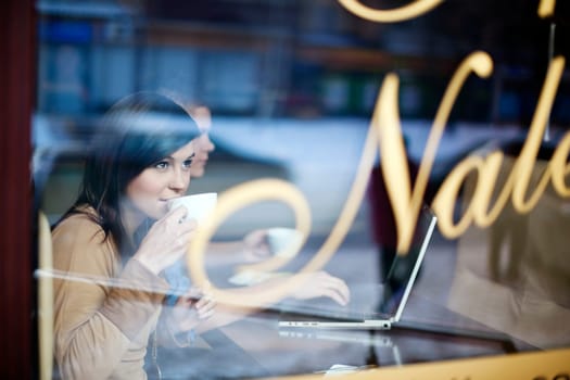 Young woman in coffee shop