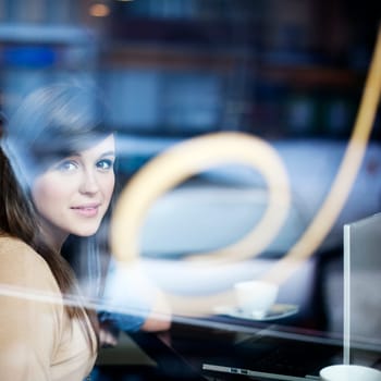 Young woman in coffee shop