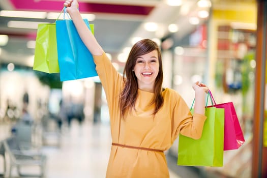 Young woman with shopping bags