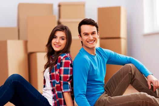 Young couple moving in their house