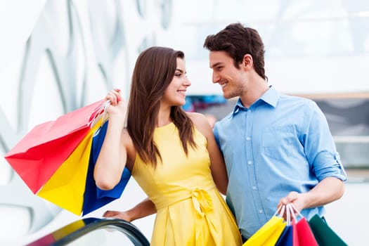 Conversing couple on shopping