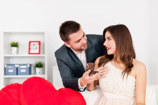 Attractive man proposing to woman