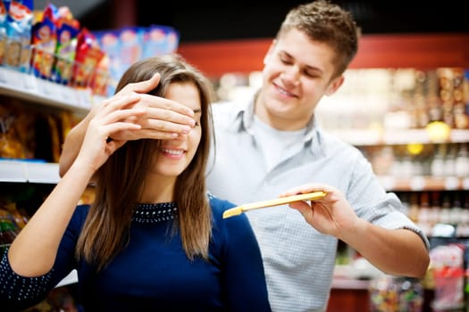 Man suprising his girlfriend