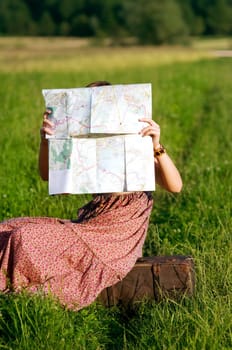 Woman reading map