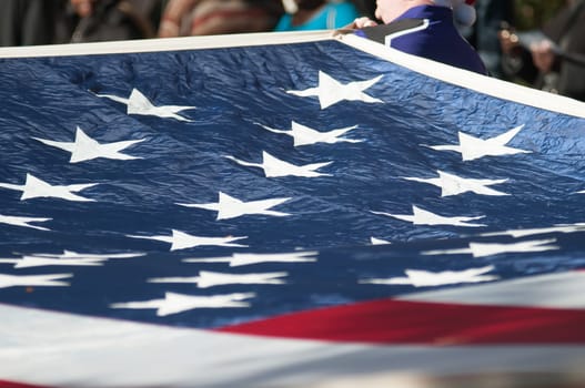 american flag carried at the parade