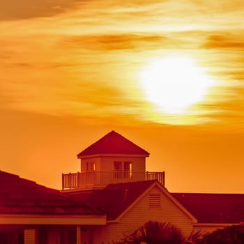 buildings silhouettes at sunrise on cape hatteras natinal seashore