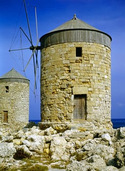 Wind mills in harbor of Rhodes, Greece