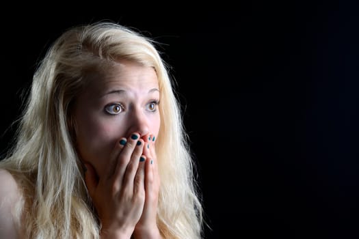 young woman is surprised