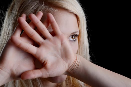 young woman shows stop