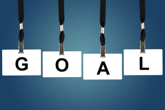 goal word on badge with blue background