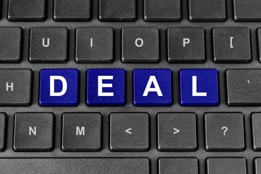 business deal blue word on keyboard