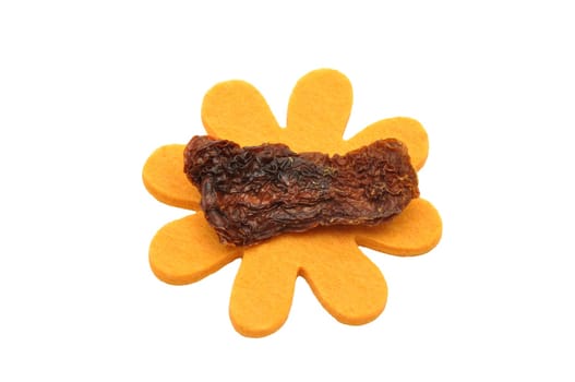 Dried tomatoes with felt decoration