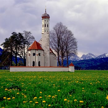 Bavarian church on Dandelion field, Germany