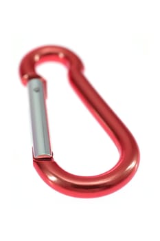 A close up shot of a climbing carabiner