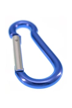A close up shot of a climbing carabiner