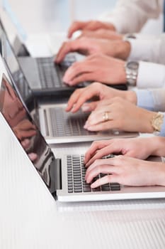 Business People Working On Laptop In Office