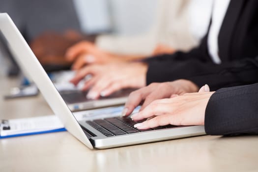 Group Of Multi Ethnic Businesspeople Working Together In Office