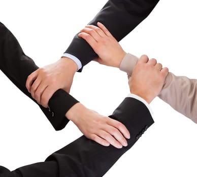 Close-up Of Businesspeople Hands That Hold Together On White Background
