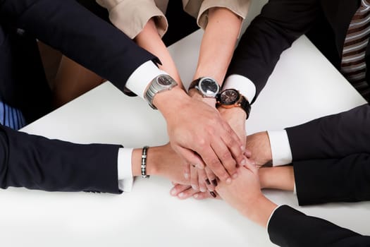 Business handshake over the deal. Taken from above