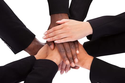 Low Angle View Of Multiracial People Stacking Hands Over Each Other