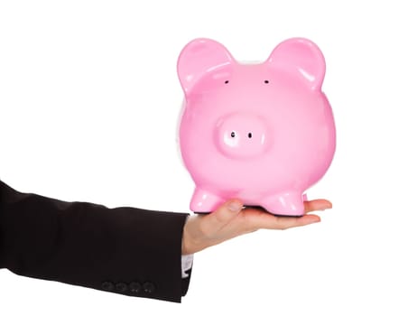 Businessman holding out a piggybank. Isolated on white