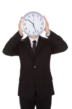 Businessman holding clock over the face. Isolated on white