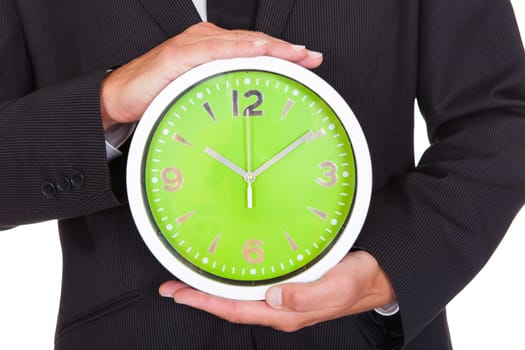 Close-up Of A Businessman's Hand Holding Clock