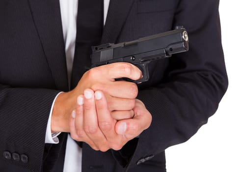 Close-up Of A Male Spy In Suit Holding Handgun