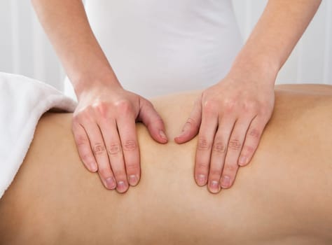 Man getting massage in the spa centre
