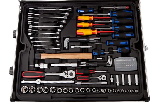 Suitcase full of various tools. Isolated on white