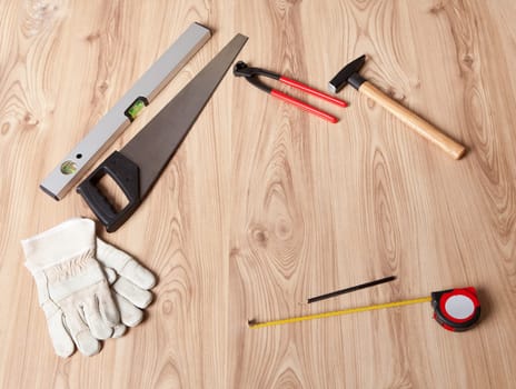 Photo of carpenter tools and building plan