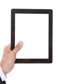 Close-up Of Hand Holding Digital Tablet Over White Background