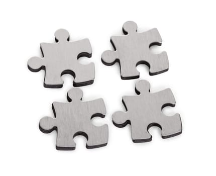 Close-up Of Jigsaw Isolated Over White Background
