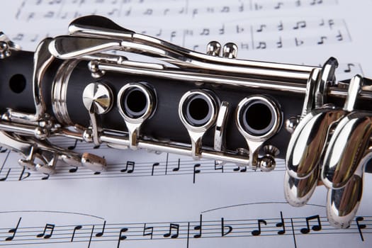 Close-up Photo Of Clarinet And Musical Note