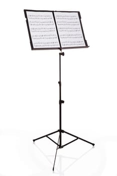 Musical Notes On Stand Over White Background