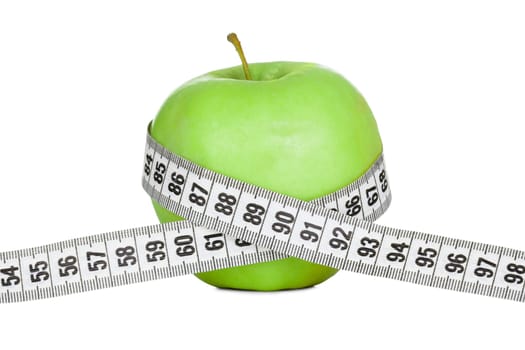 Apple wrapped in measuring tape. Diet concept. Isolated in white