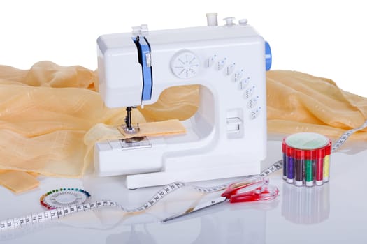 Sewing machine and related items. Isolated on white