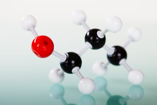 Model of molecular structure on green reflective background