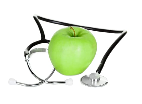 Green apple and stethoscope isolated on white