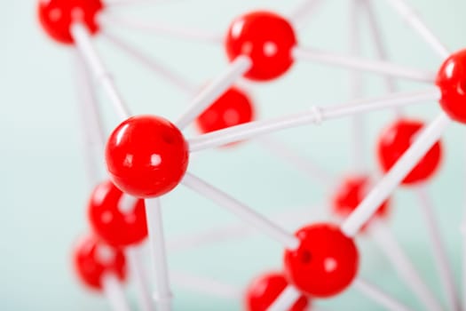 Model of copper molecular structure on green reflective background
