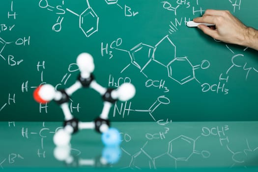 Model of molecular structure on green reflective background