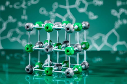 Model of molecular structure on green reflective background