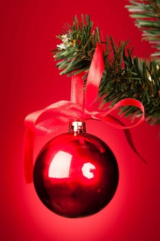 Close-up Of Red Decorative Bauble Hanged On Christmas Tree