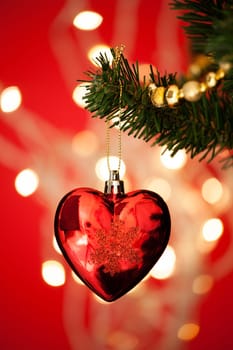 Close-up Of Heart Shape Bauble On Christmas Tree